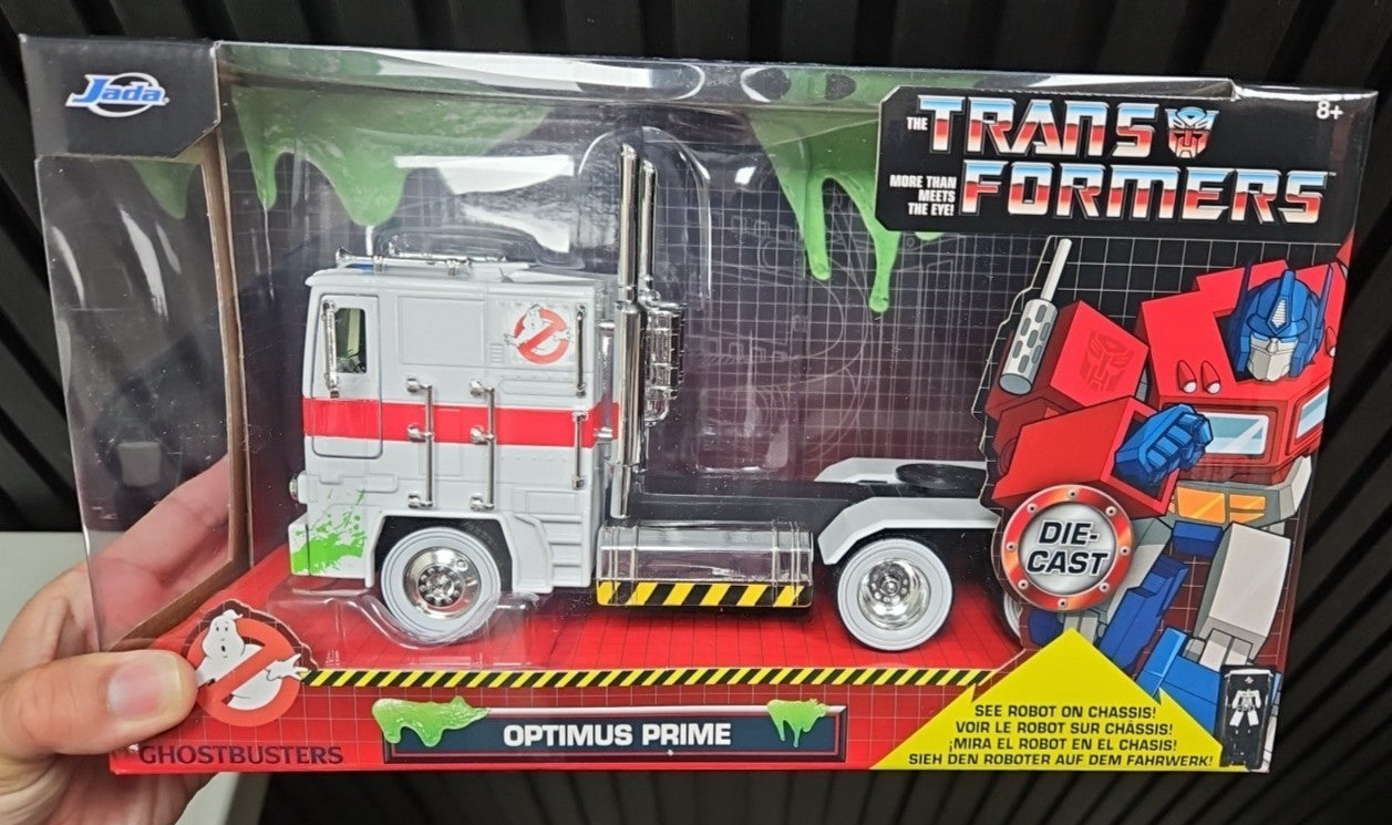 Jada: Transformers/Ghostbusters - Slimed Optimus Prime (W/ ECTO1 License Plate)
